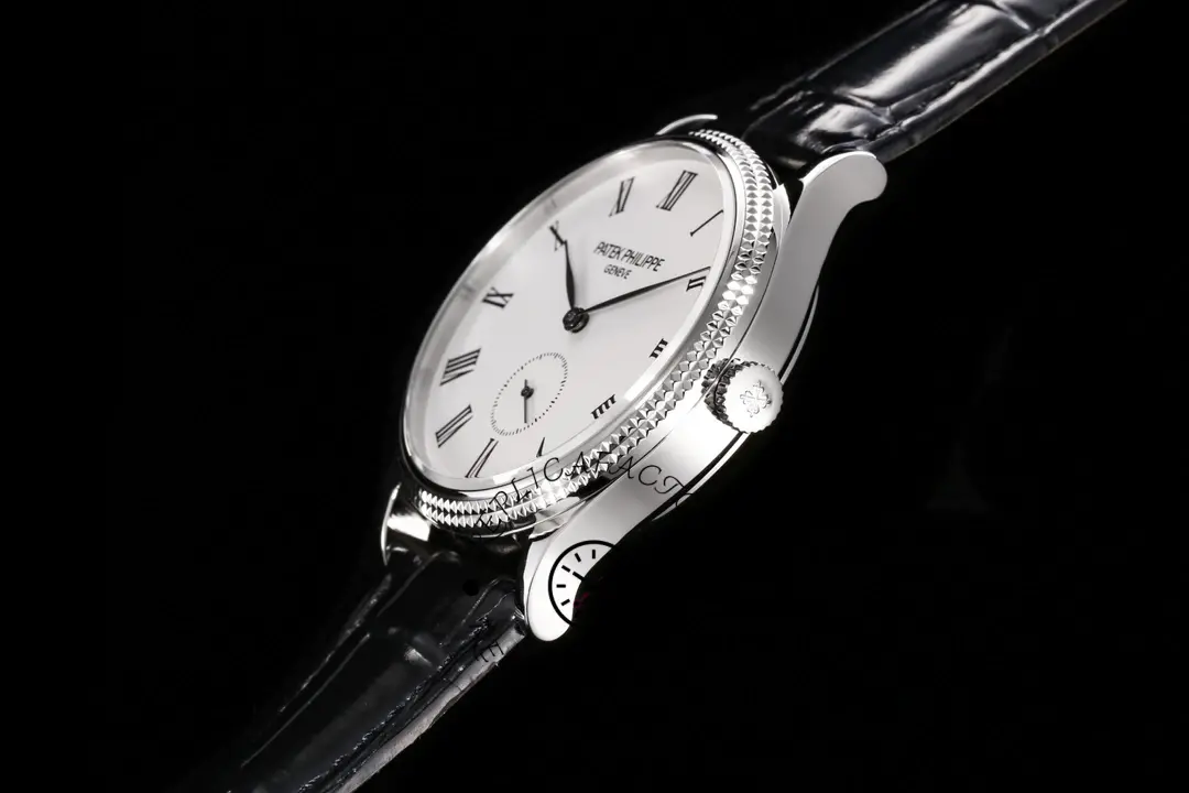Side profile of the Patek Philippe 5119G-001, showing thin case, bezel edge, and crown position.