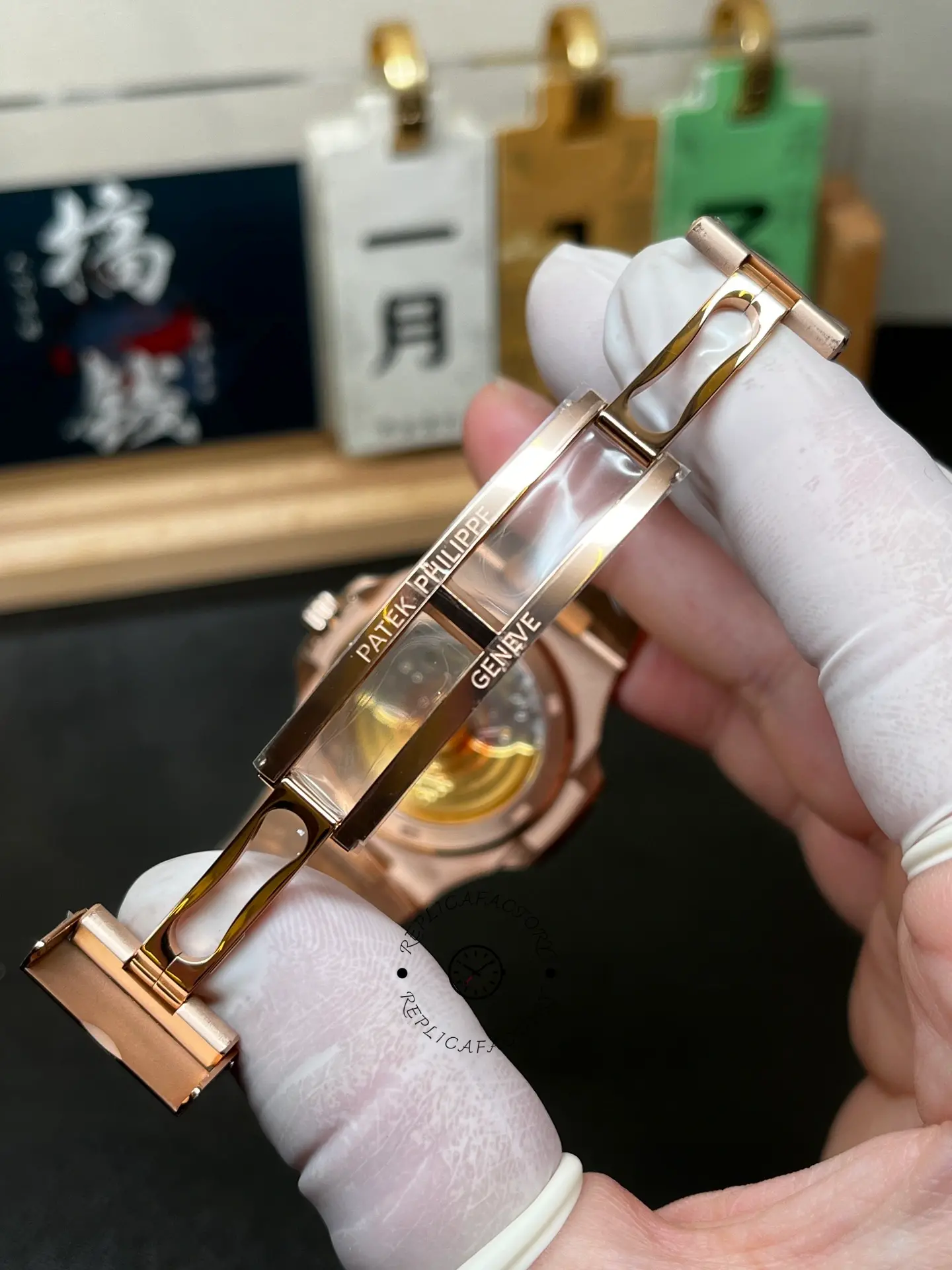 Close-up of the 5711 1R 001 folding clasp, showing “PATEK PHILIPPE” and “GENEVE” engraving.