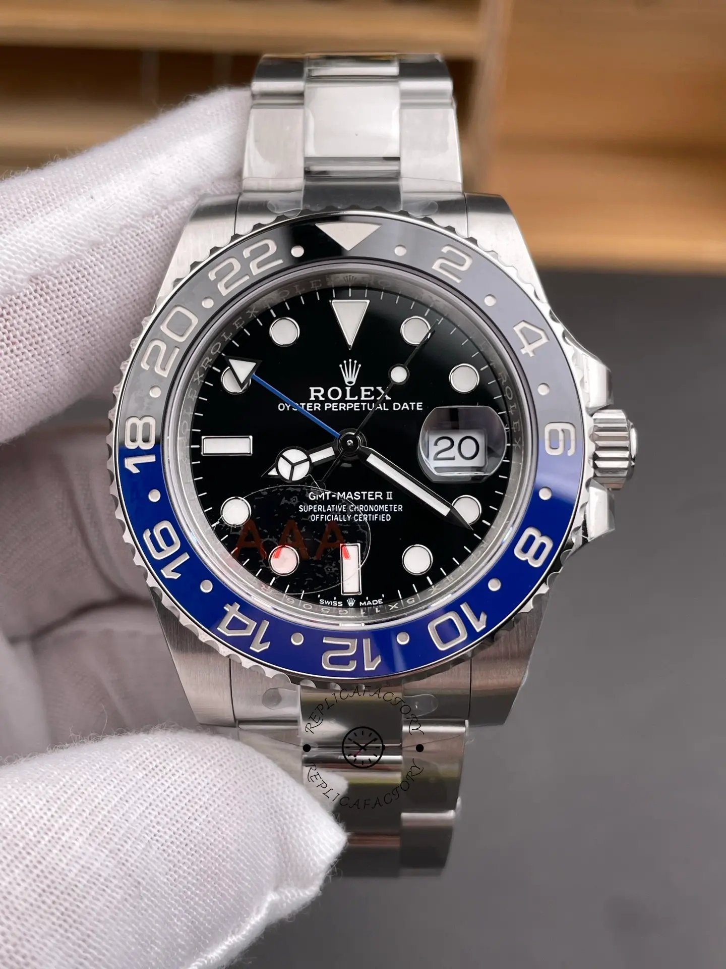 Close front view of Rolex GMT-Master II 116710BLNR black dial with blue GMT hand and Oyster bracelet.