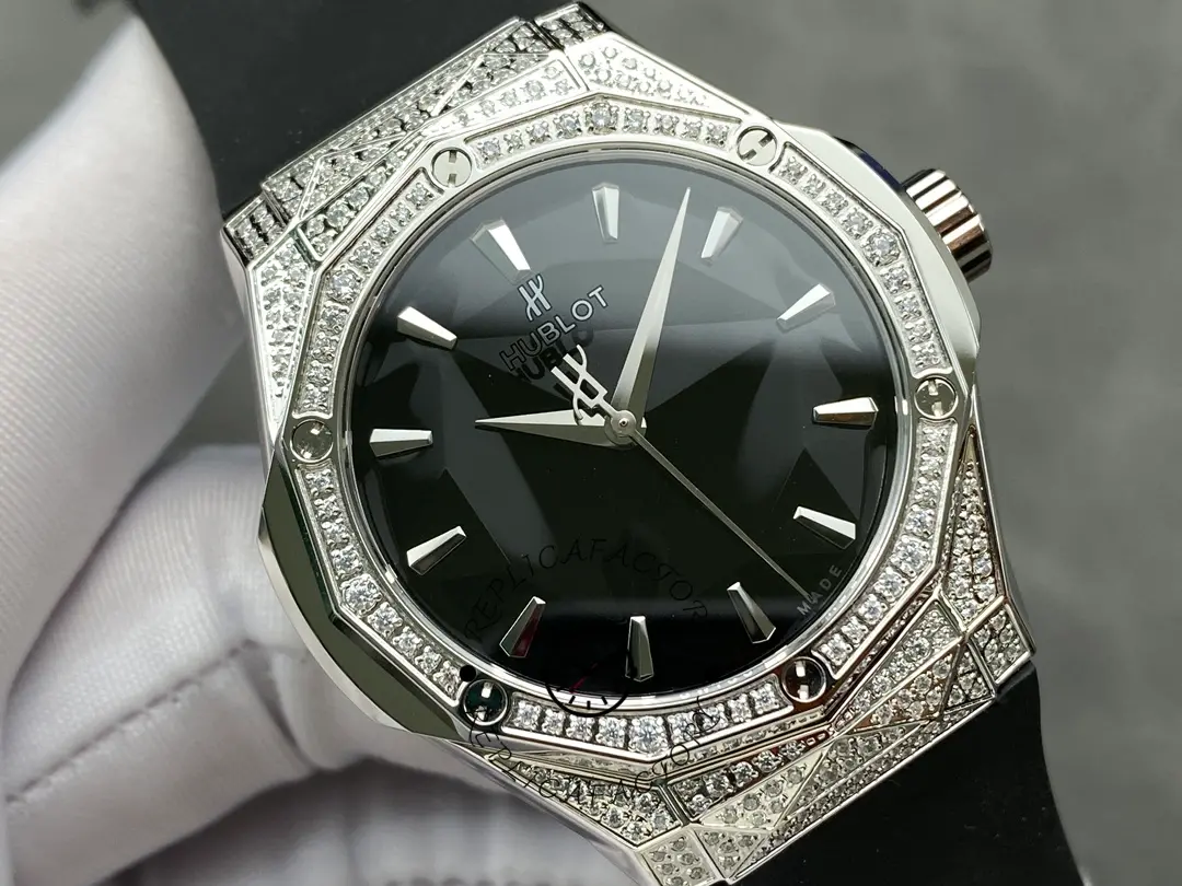 Close-up angled shot of Hublot Classic Fusion 550.NS.1800.RX.1604.ORL19 with pavé bezel and polished indexes.