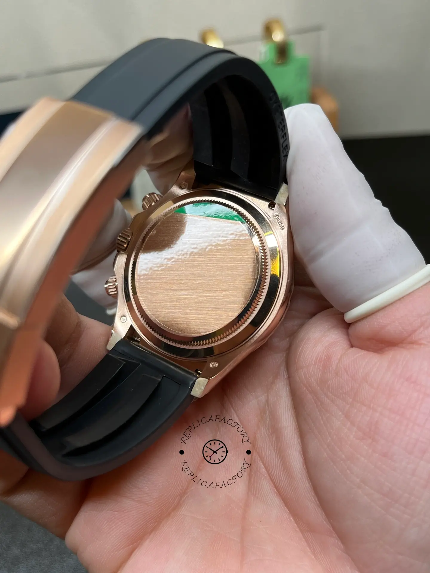 Rear caseback view of Rolex 126515LN-0010 showing solid caseback and attached black Oysterflex strap.