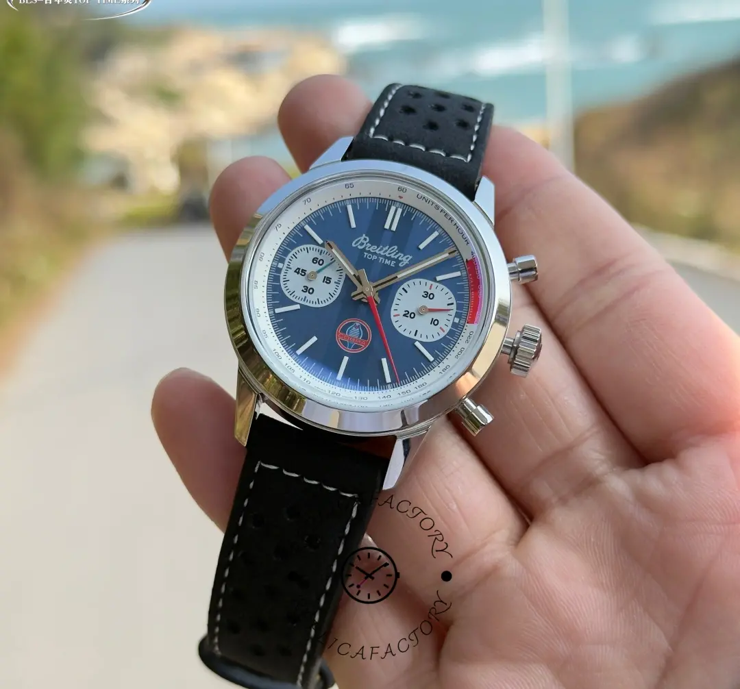 Breitling Top Time B01 Shelby Cobra AB01763A1C1X1, close wrist view of blue dial, white subdials, and chrono pushers.