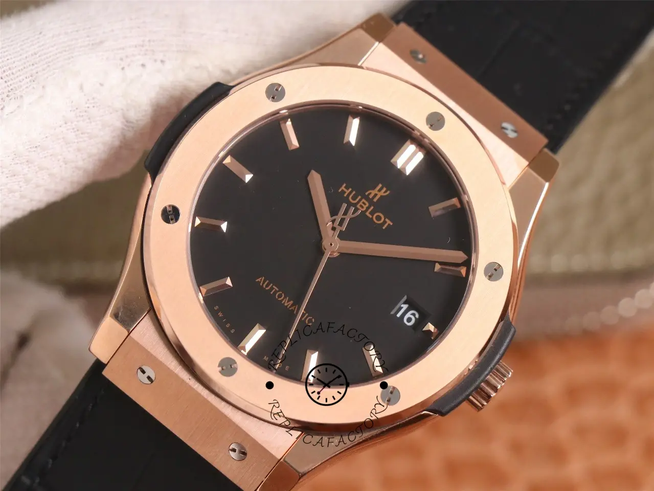 Angled close-up of Hublot Classic Fusion 542.OX.1181.LR showing dial texture and King Gold case finish.