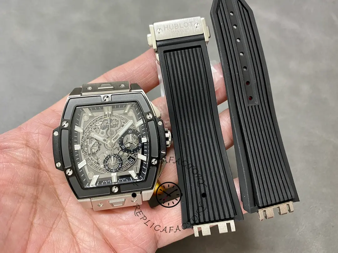 Watch and strap bundle: Hublot Spirit of Big Bang 642.NM.0170.RX with extra strap shown in hand.