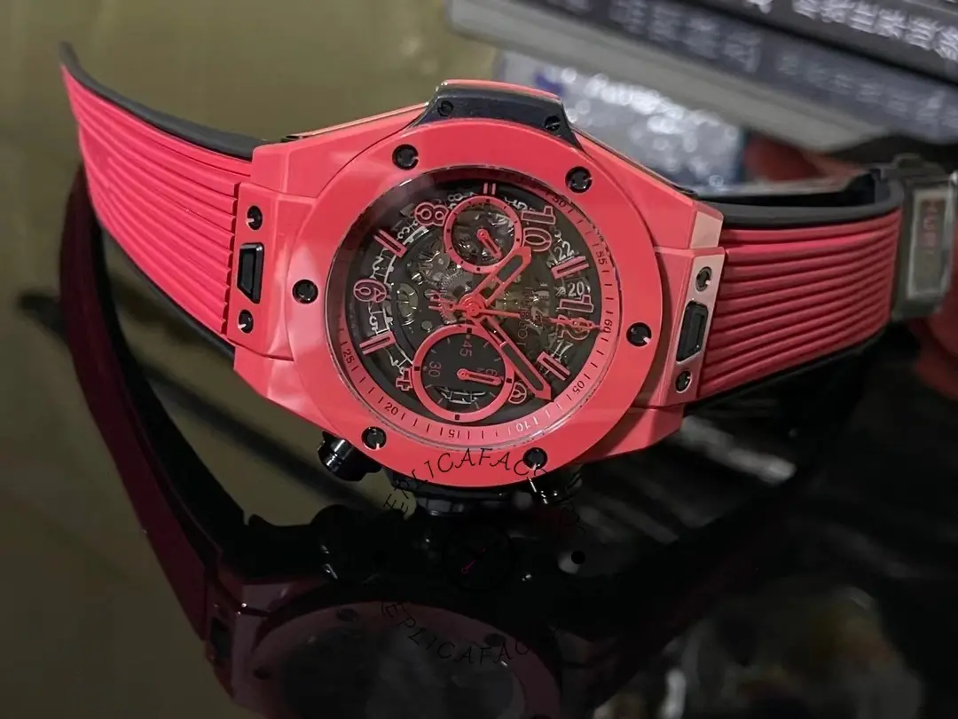 Three-quarter view of Hublot Big Bang Unico Red Magic Ceramic 411.CF.8513.RX on display.