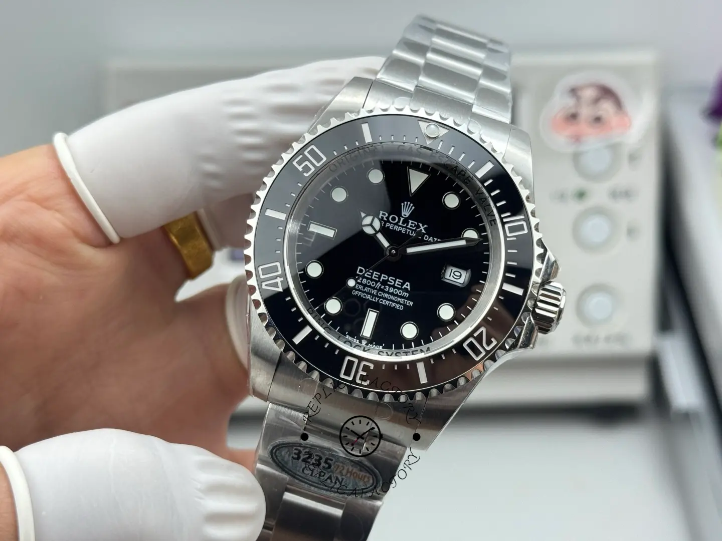 Angled front view of Rolex Sea-Dweller 126600 emphasizing the diver bezel numerals and dial depth.