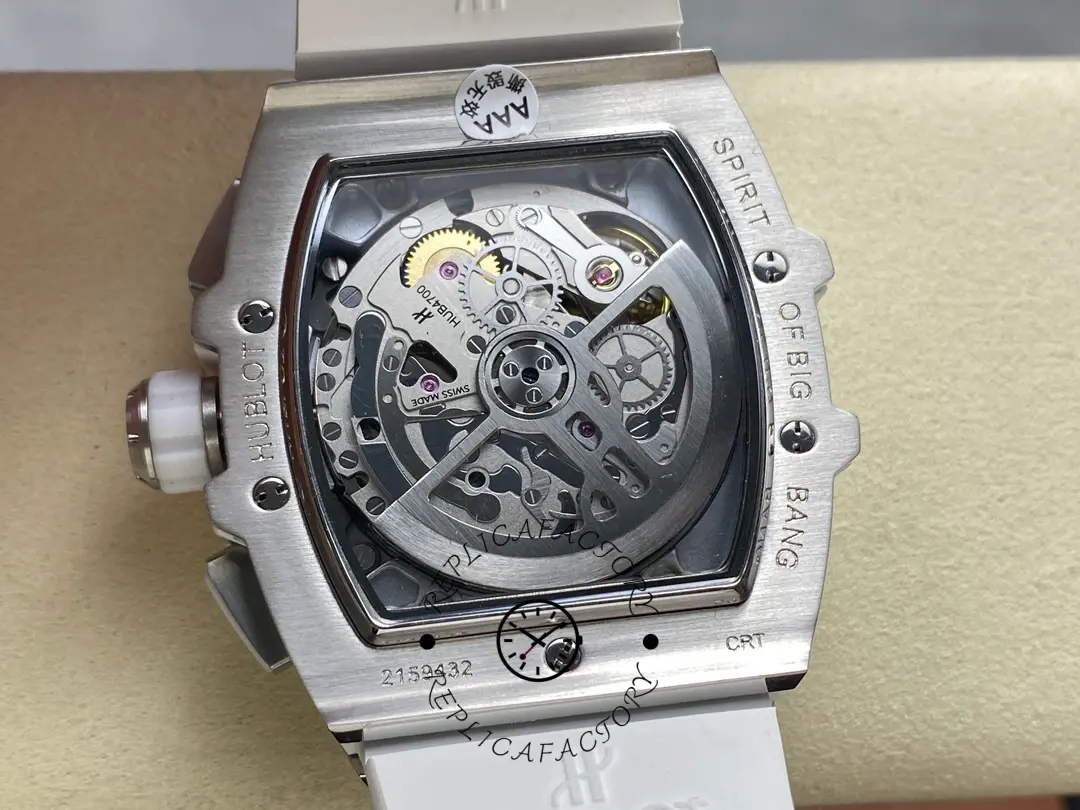 Caseback view of Hublot 642.NE.2010.RW.1604 with exhibition back showing rotor and movement on white strap.
