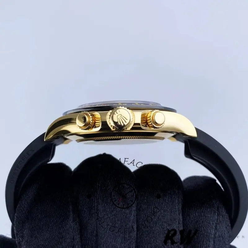 Side profile of Rolex Daytona 116518LN held in glove, showing case flank and pusher alignment.