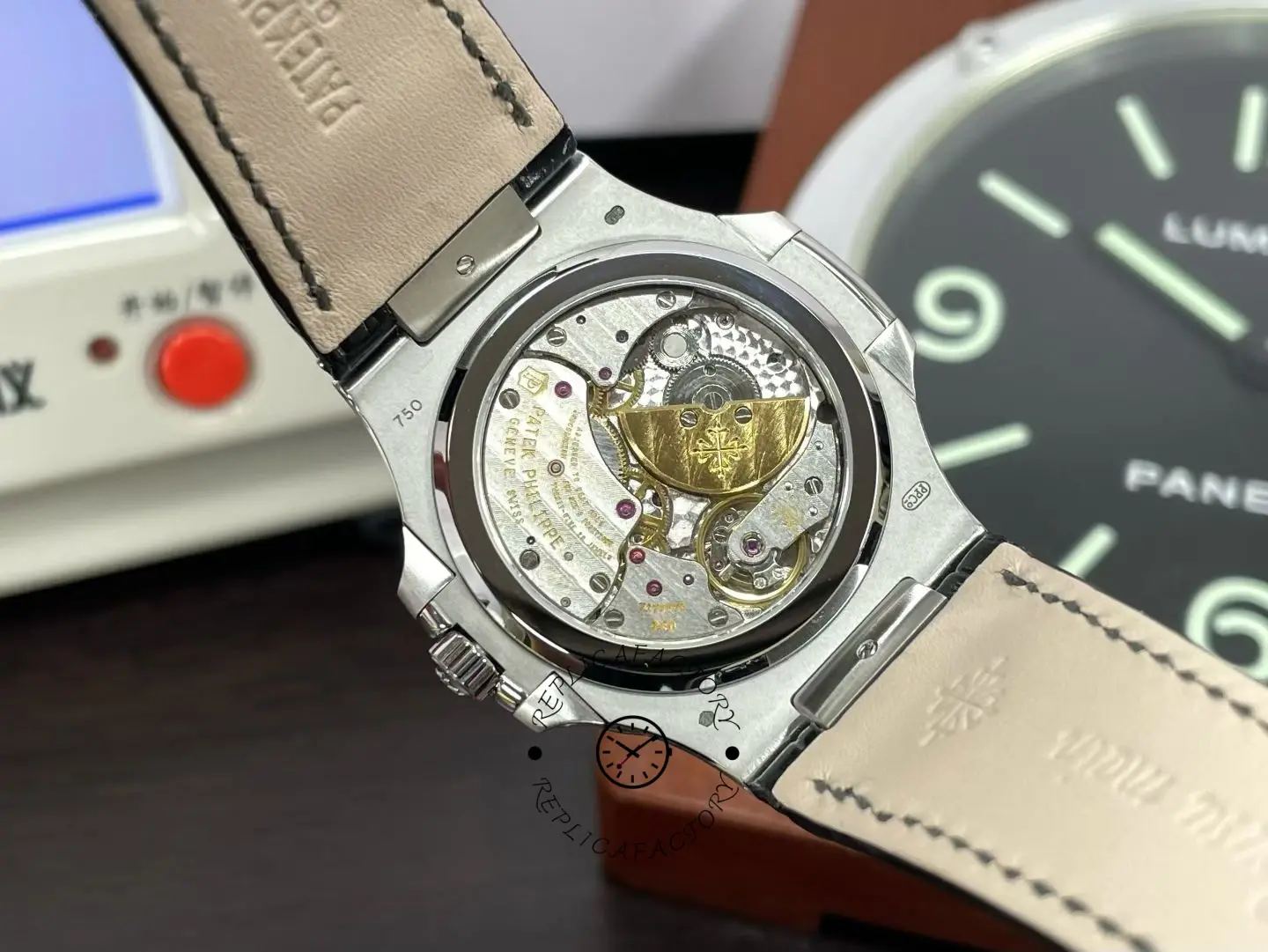 Exhibition caseback of Patek Philippe Nautilus 5724G 001 revealing automatic movement details.