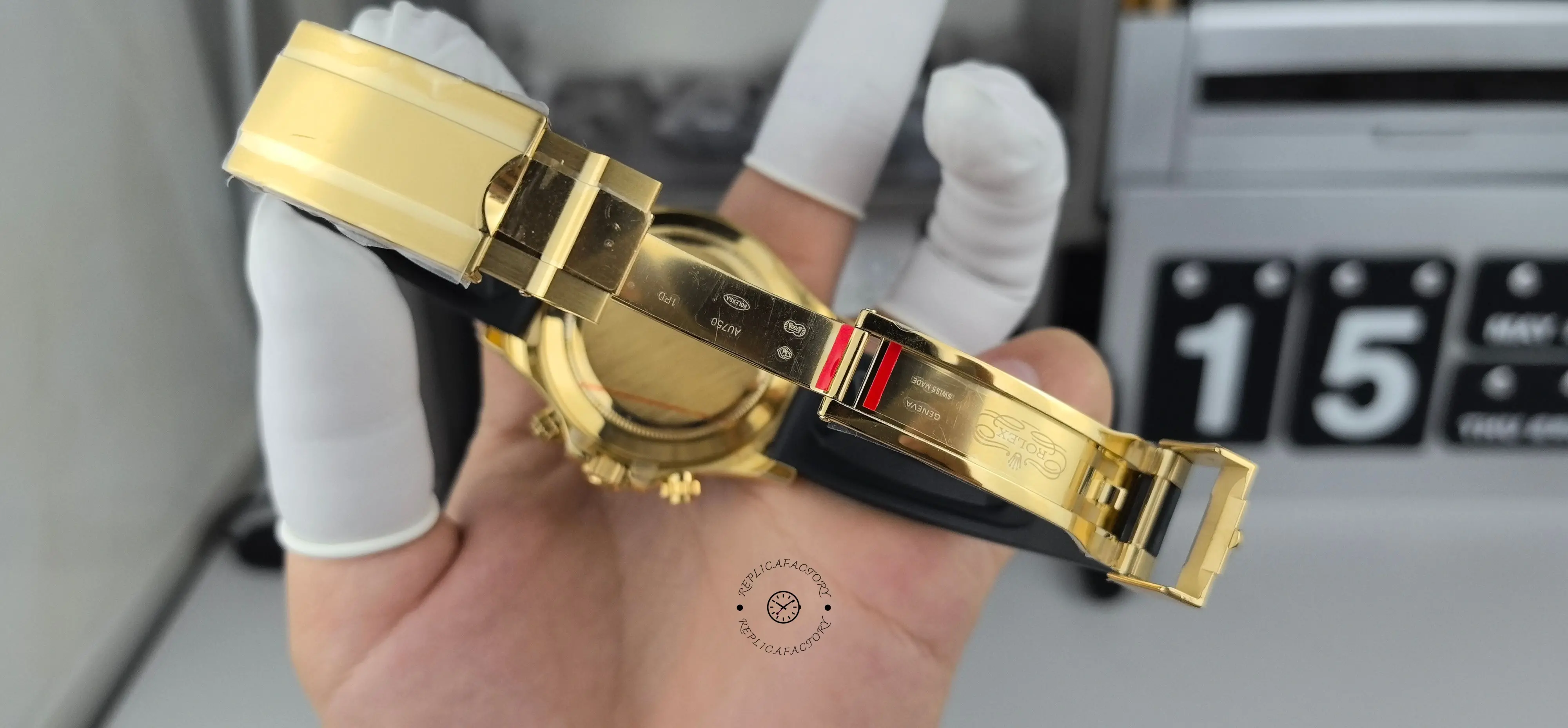 Inner clasp view of Rolex Daytona 116518LN showing gold-tone clasp interior and folding mechanism.
