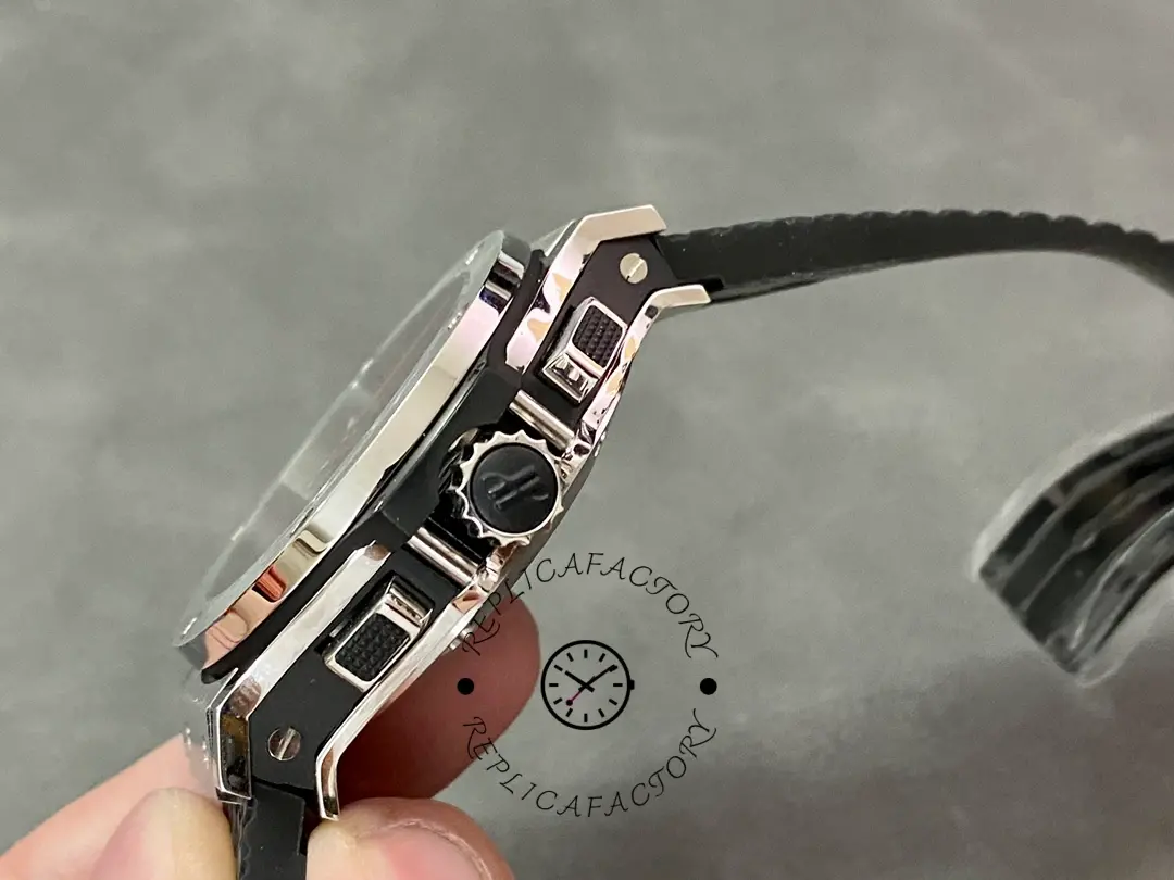 Crown and pusher side view of Hublot Big Bang 301.SB.131.RX showing signed crown and pushers.