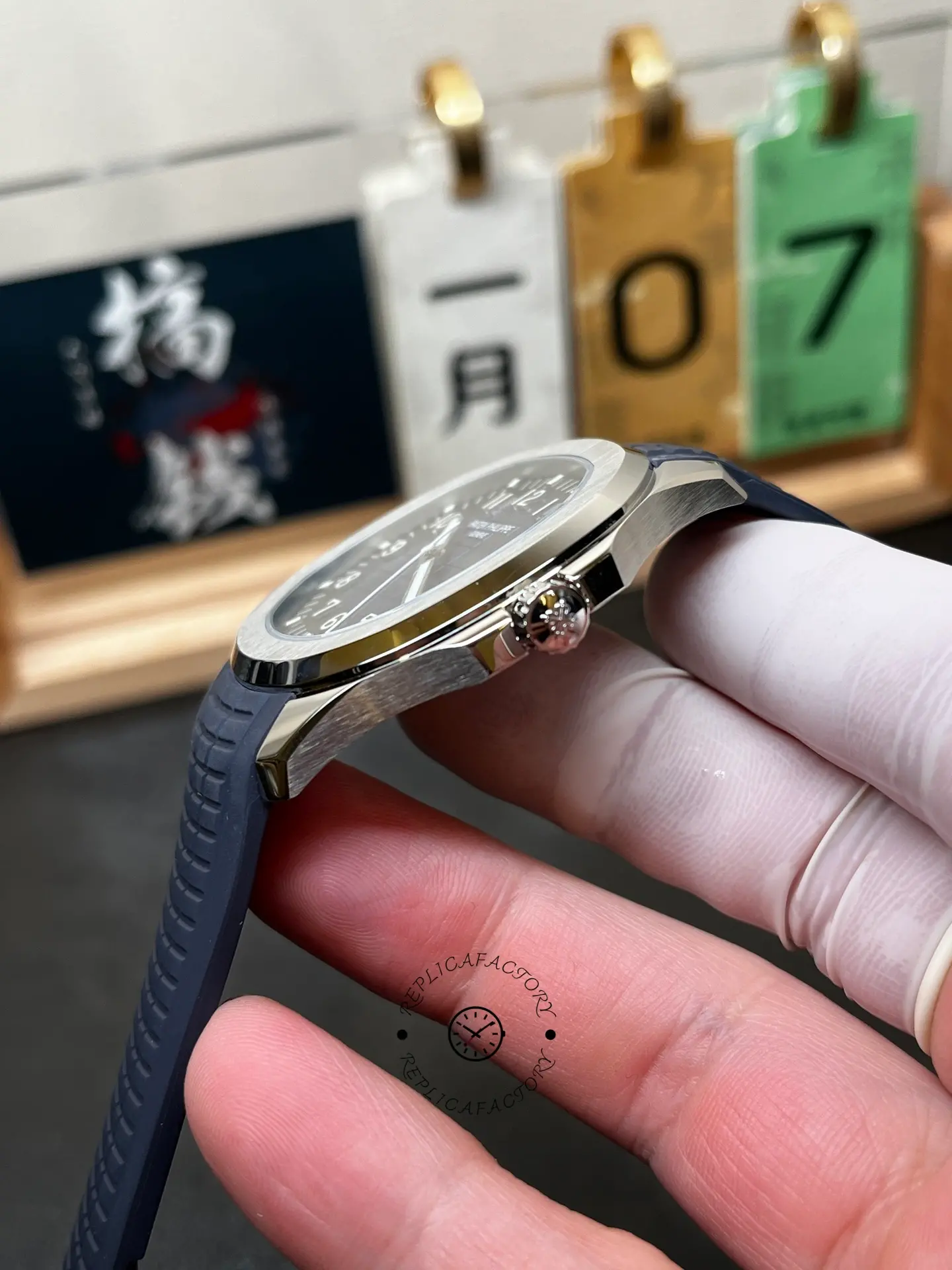 Side profile of Patek Philippe Aquanaut 5168G-001 showing crown position.