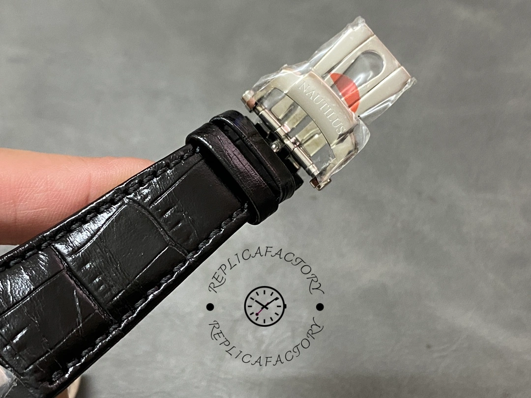 Clasp close-up of the Patek Philippe Nautilus 5711/1A, showing the folding buckle and finish.