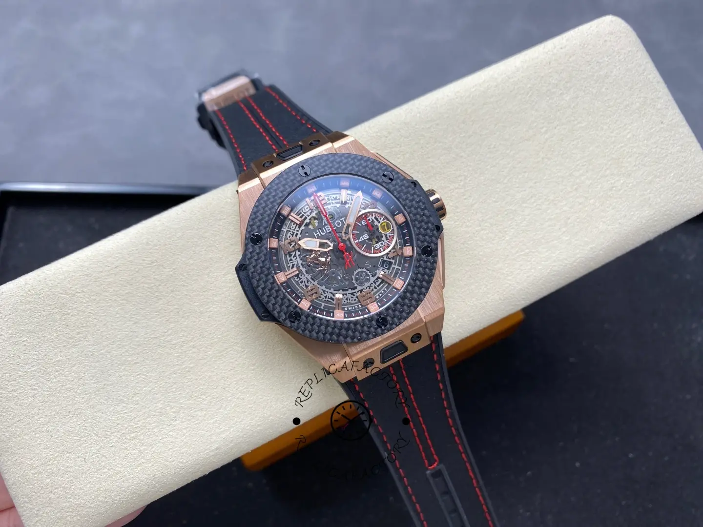 Full watch on box: Hublot Big Bang Unico Ferrari 401.OX.0123.VR with black strap and skeleton dial.