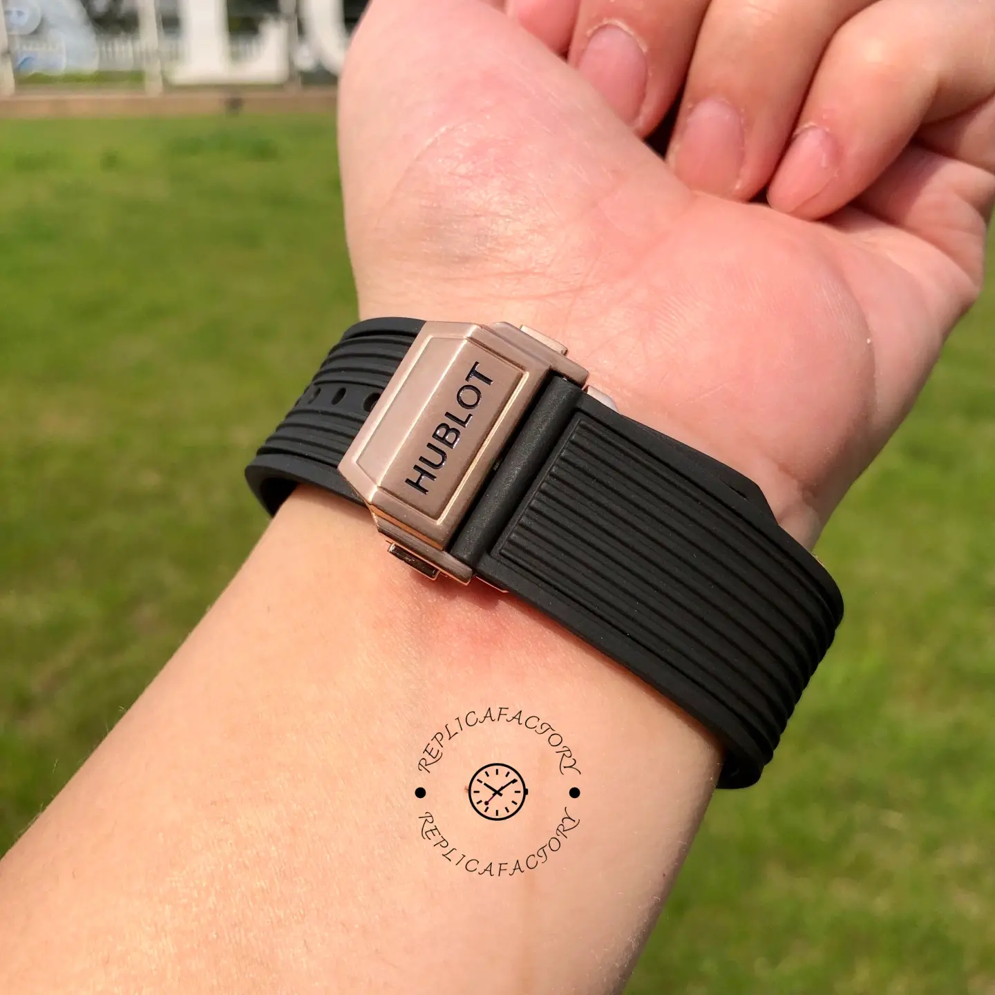 Clasp close-up of Hublot 421.OX.1180.RX.0904 showing the deployant clasp with HUBLOT engraving on wrist.