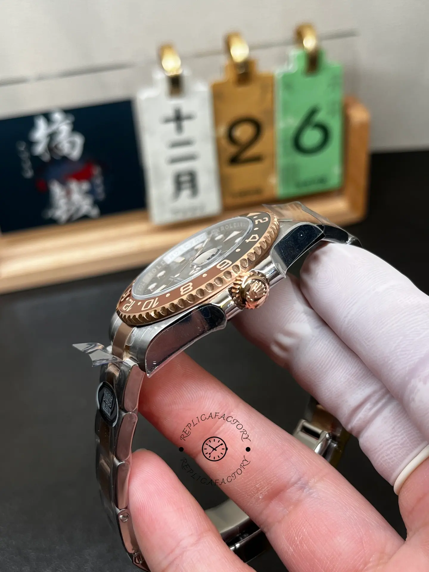 Crown-side angled view of Rolex 126711CHNR showing rose gold crown, bezel edge, and case profile.