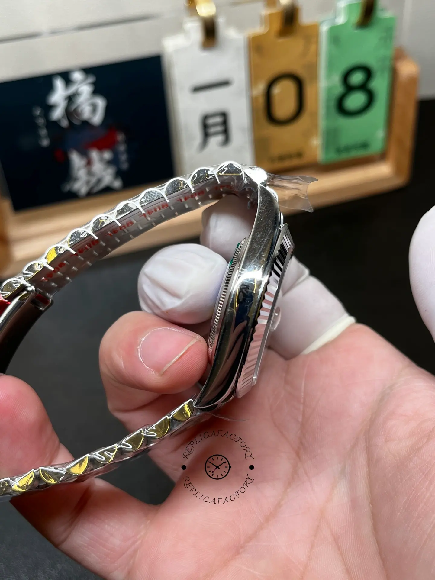 Opposite side profile of Rolex Datejust 126334-0014 showing case thickness, bezel edge and Jubilee bracelet curve.