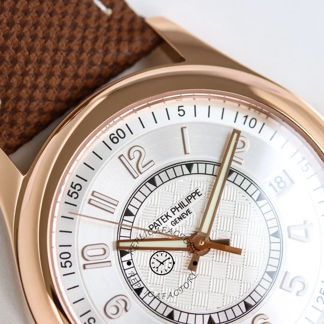 Macro dial close-up of the Patek Philippe Calatrava 6007A-001, focusing on numerals and minute markers.