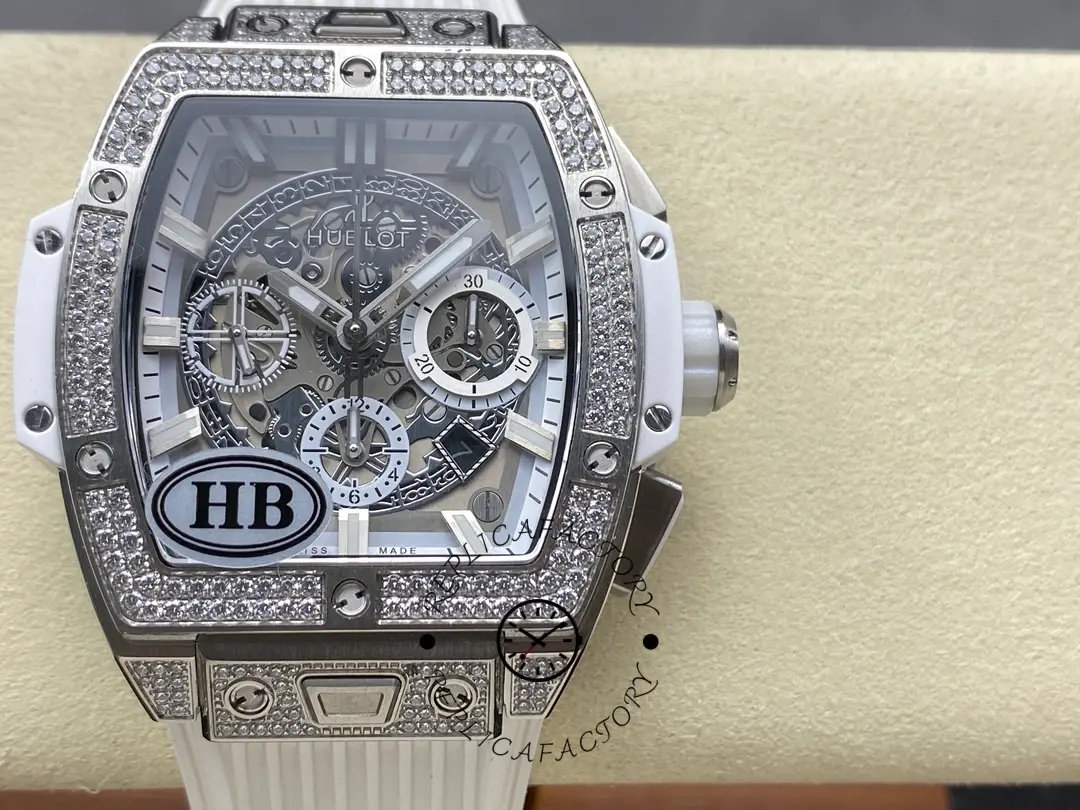 Front close-up of Hublot 642.NE.2010.RW.1604 showing diamond bezel look, baton markers, and skeleton chronograph layout.