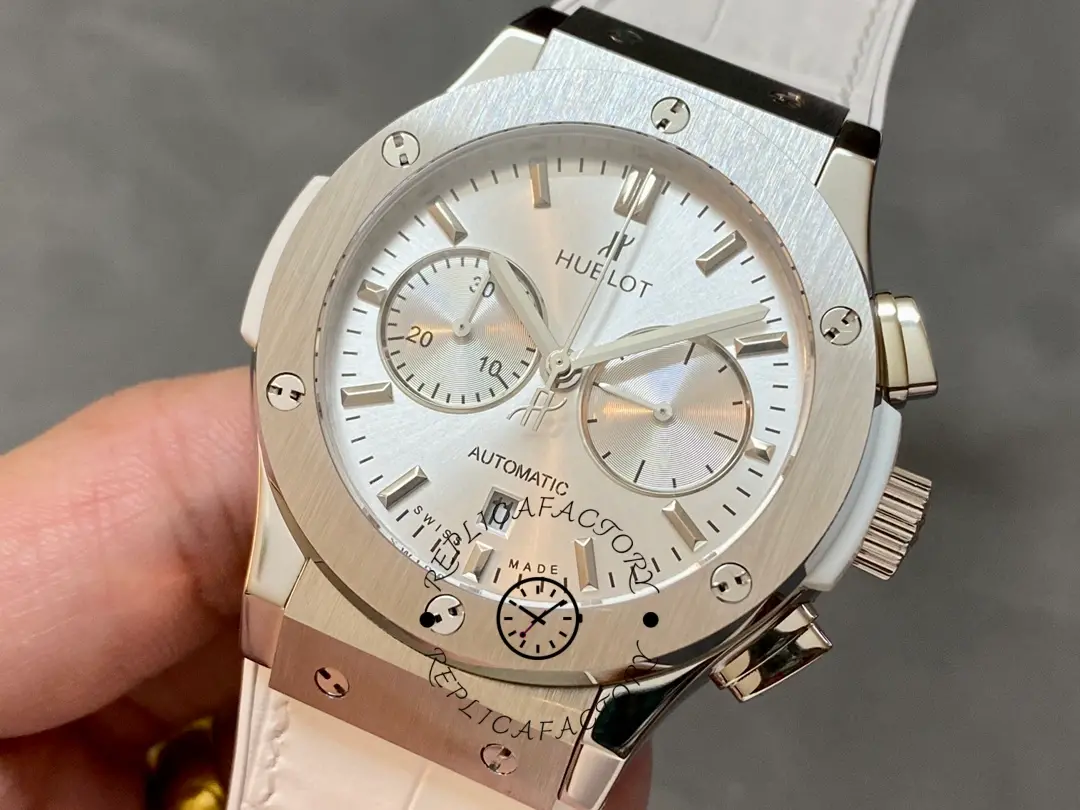 Close-up of Hublot 521.NX.7071.LR showing light chronograph dial and subdials.