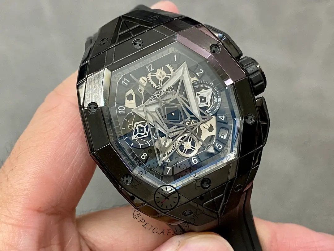 Angled view of Hublot 648.CX.0114.RX.MXM23 highlighting faceted bezel screws and geometric dial motif.