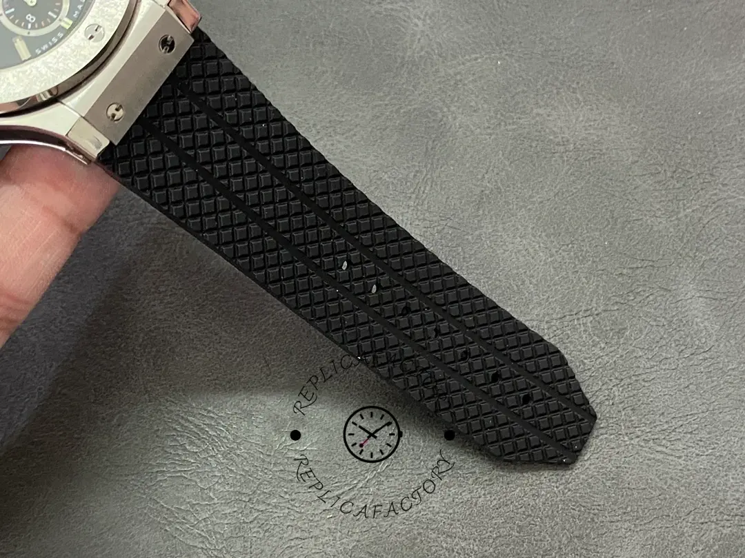 Rubber strap holes detail of Hublot Big Bang 301.SB.131.RX showing textured pattern and sizing holes.
