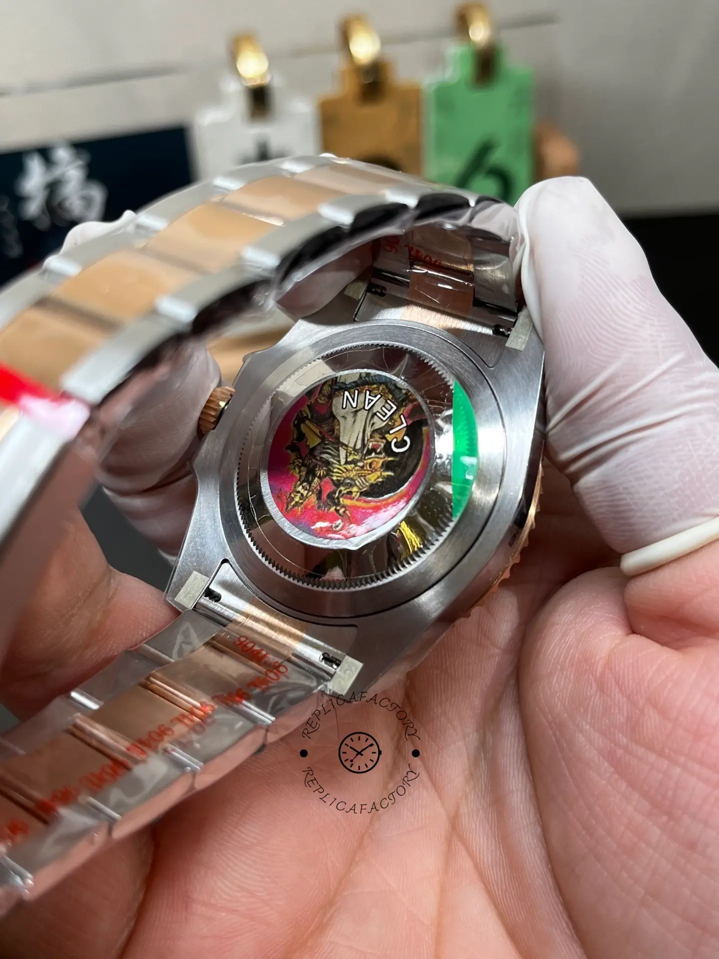 Rear caseback view of Rolex 126711CHNR with CLEAN sticker and two-tone Oyster bracelet.