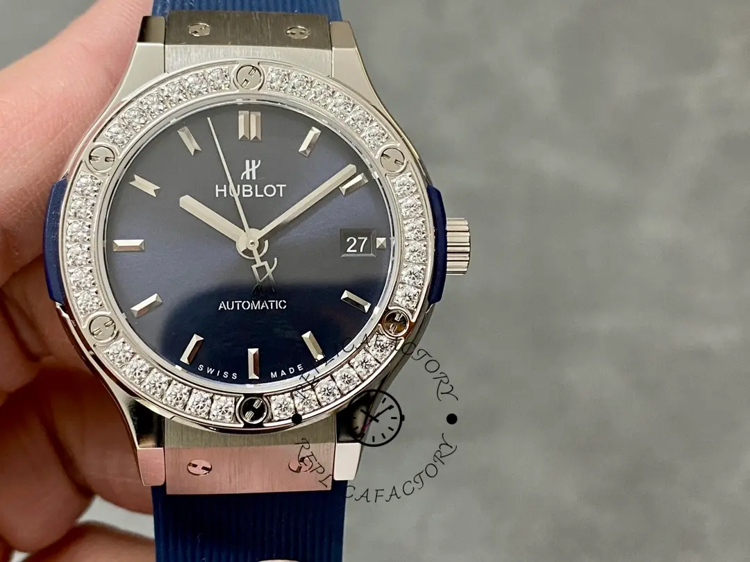 Close-up front of Hublot Classic Fusion 565.NX.7170.RX.1204 highlighting diamond bezel and blue dial markers.