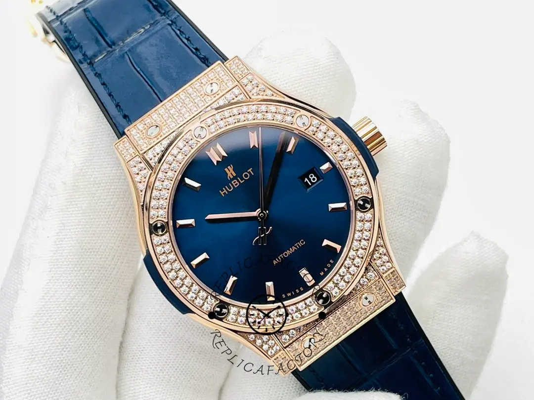 Hublot Classic Fusion 542.OX.1181.LR.1704 blue dial on glove, clear indices and diamond bezel.