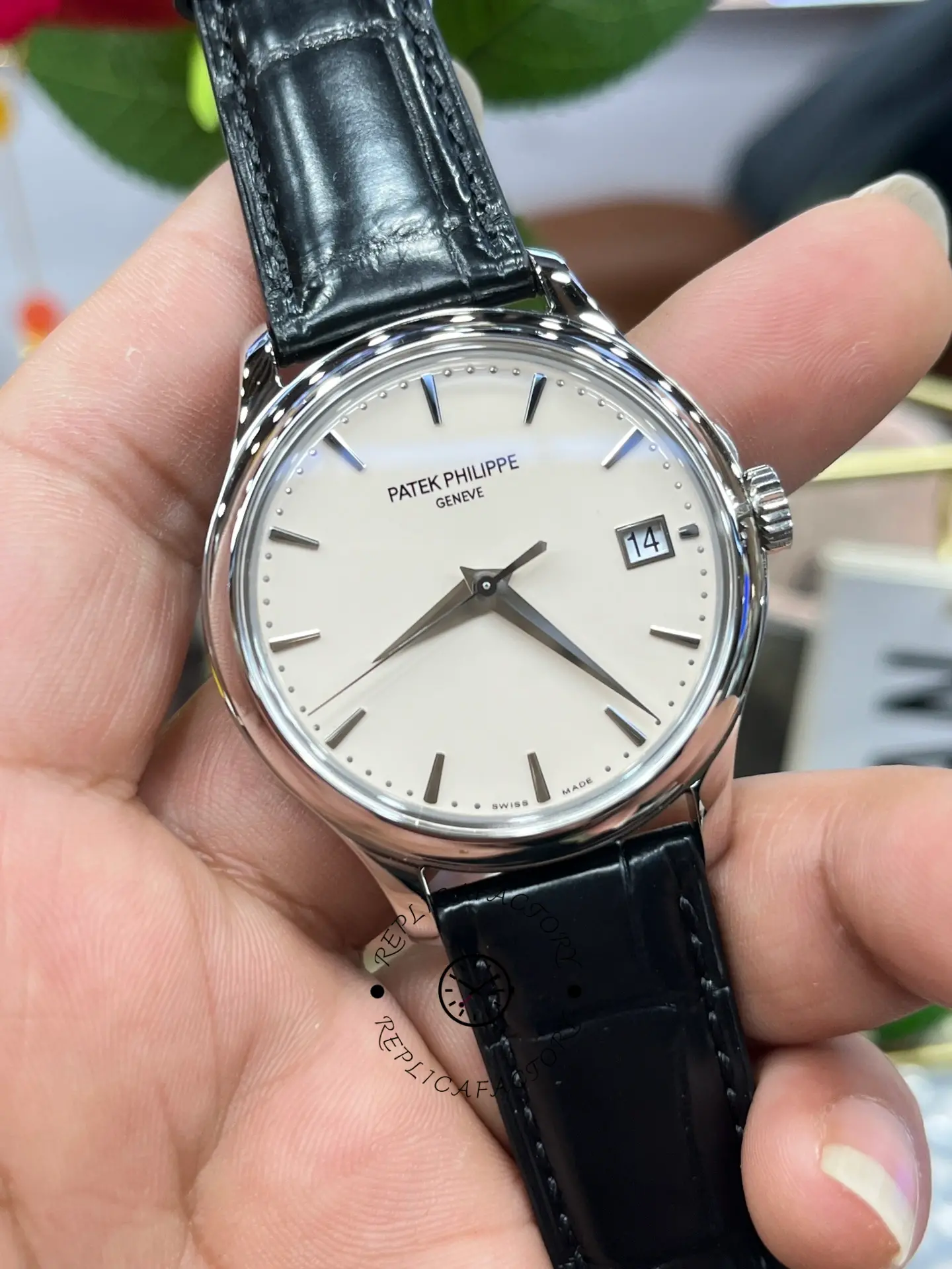Front view of the Patek Philippe Calatrava 5227G-001 showing the balanced dial and polished case edge.