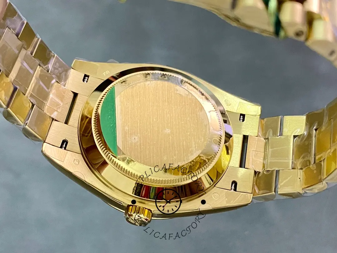 Back view of Rolex 228238-0061 showing caseback and opened President bracelet.