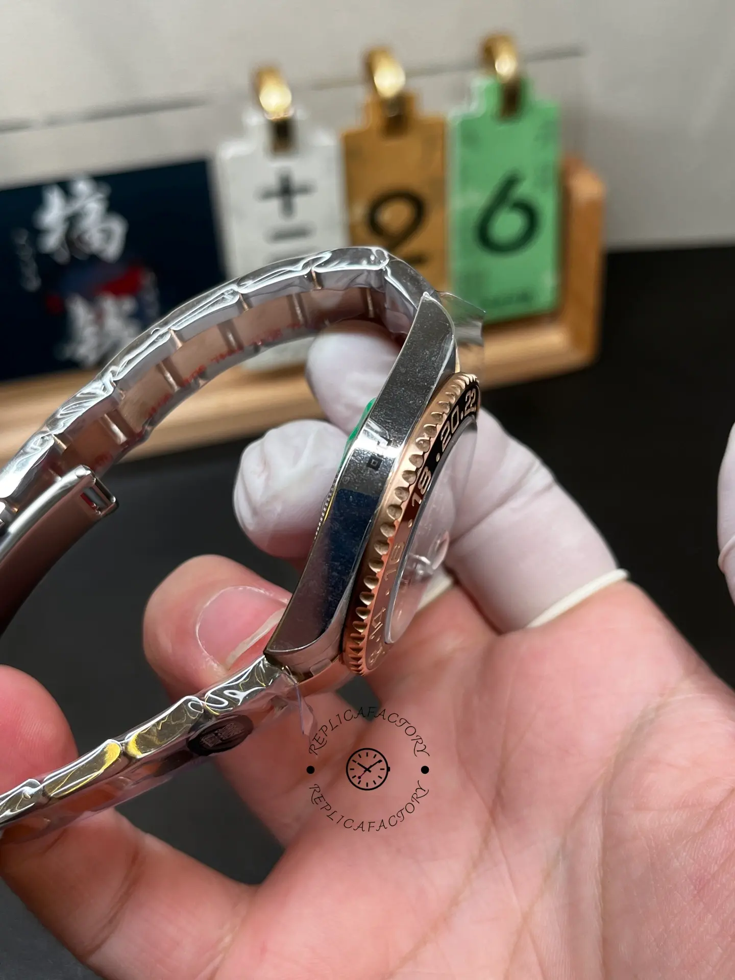 Side profile of Rolex 126711CHNR GMT-Master II showing polished case side and bezel teeth.