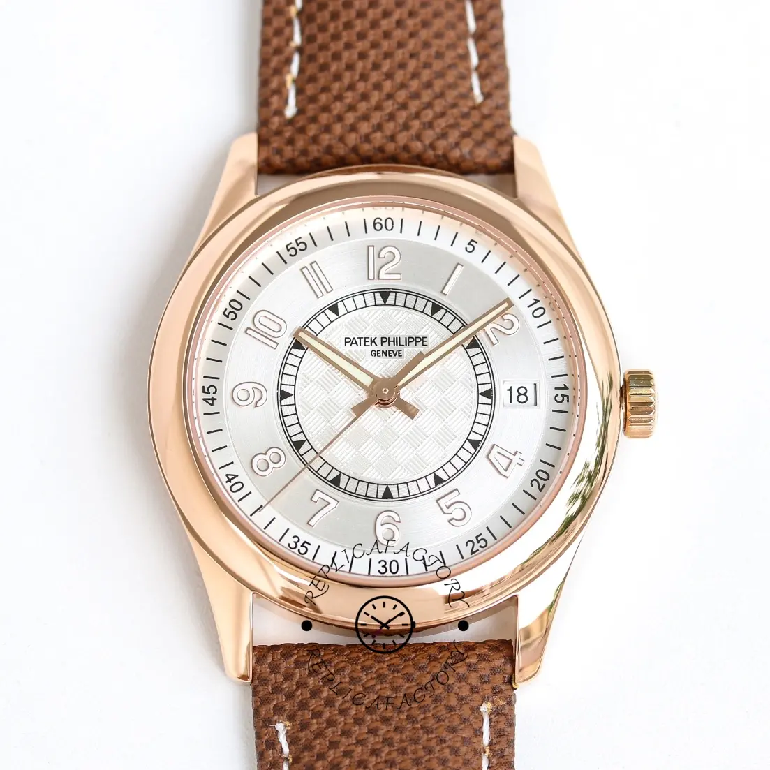 Full watch view of the Patek Philippe Calatrava 6007A-001, showing dial layout and brown strap style.