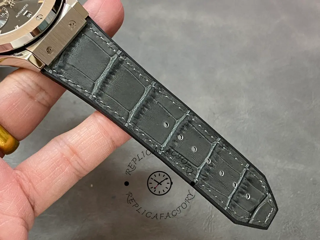 Grey strap top view of Hublot 521.NX.7071.LR showing texture and stitching line.