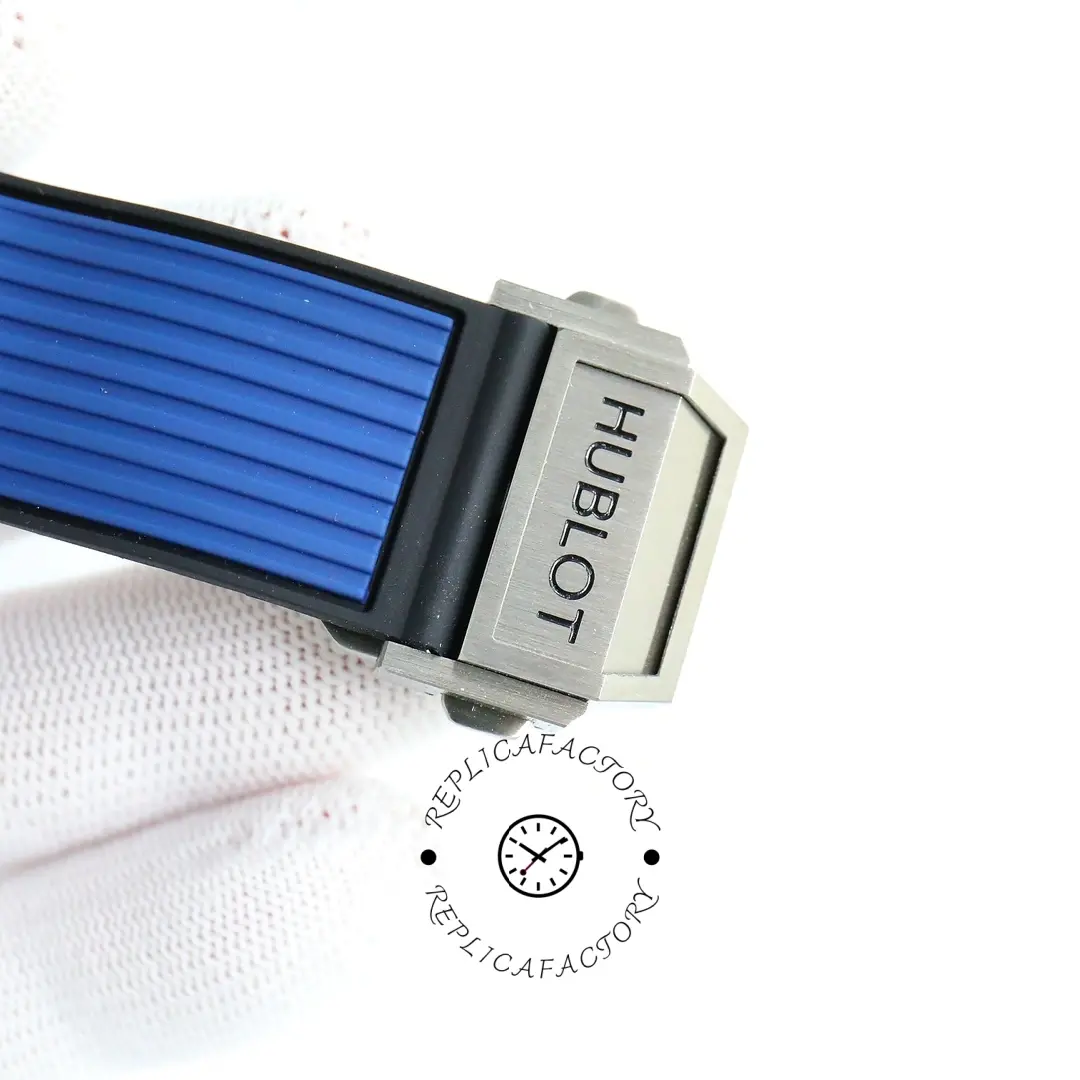 Strap clasp detail of Hublot Big Bang 421.NL.5170.RX showing blue strap texture and metal buckle.