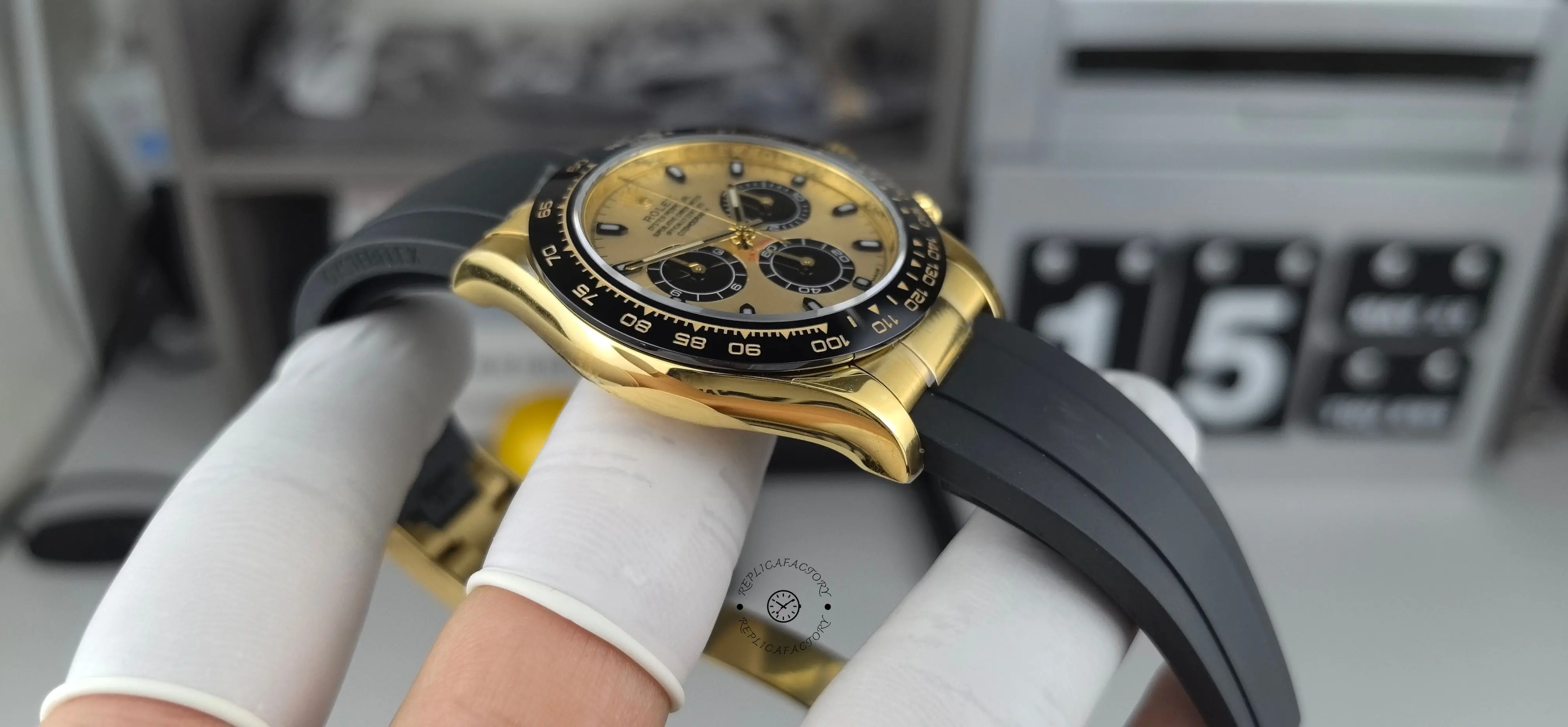 Left side profile of Rolex Daytona 116518LN with yellow gold-tone case and Oysterflex strap.