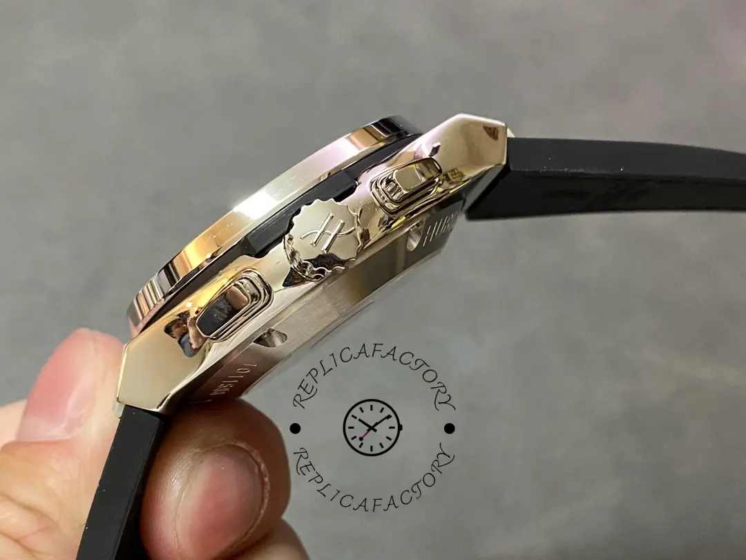 Crown-side angle of Hublot 521.NX.7071.LR showing pushers and crown detail.