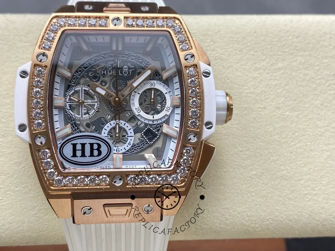 A photo of Hublot 642.OE.2010.RW.1204 placed on a pillow shows the appearance of the rose gold case and diamond bezel.