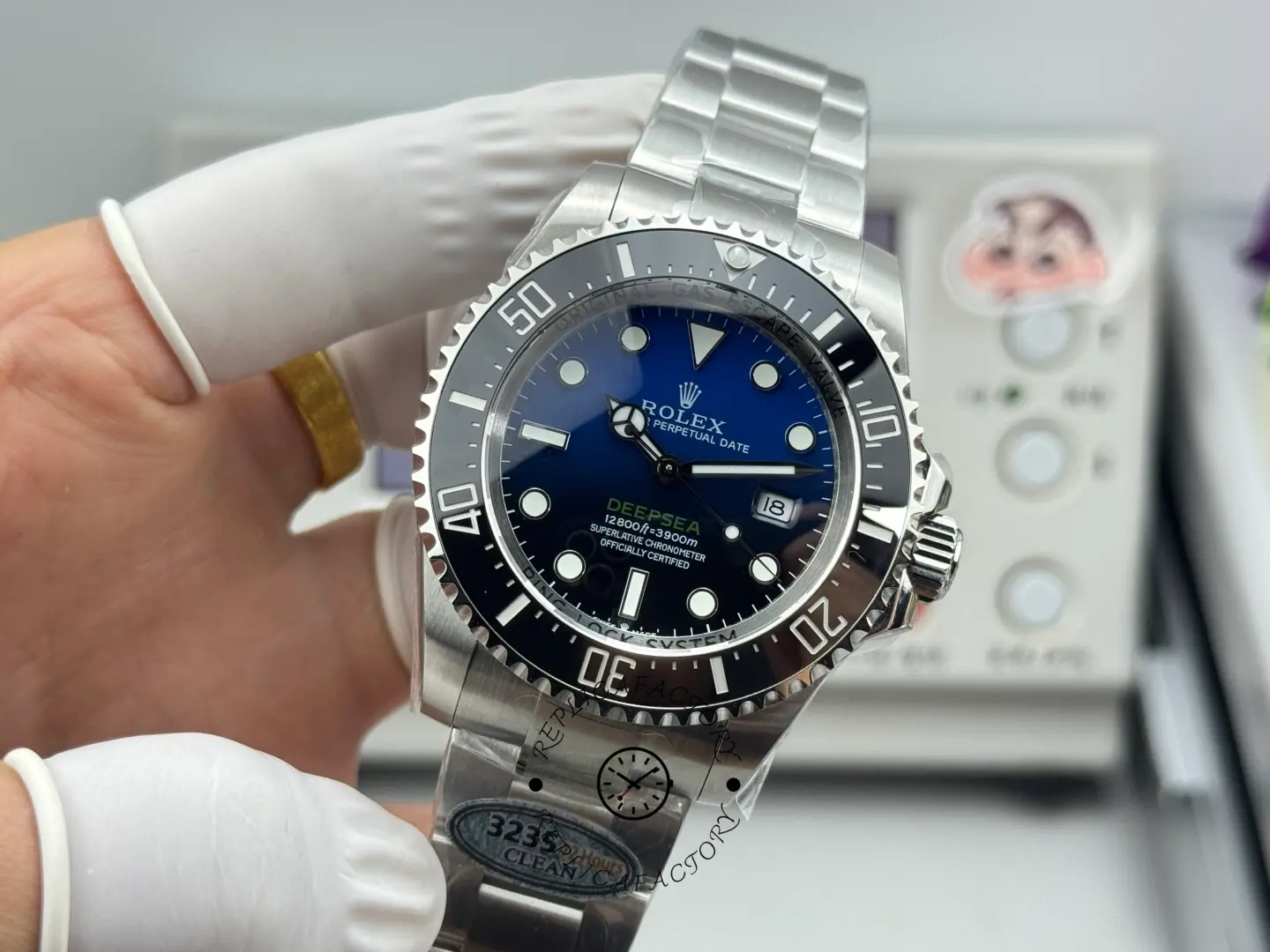 Full front shot of Rolex Sea-Dweller Deepsea 116660 highlighting luminous hour plots and stainless bracelet.