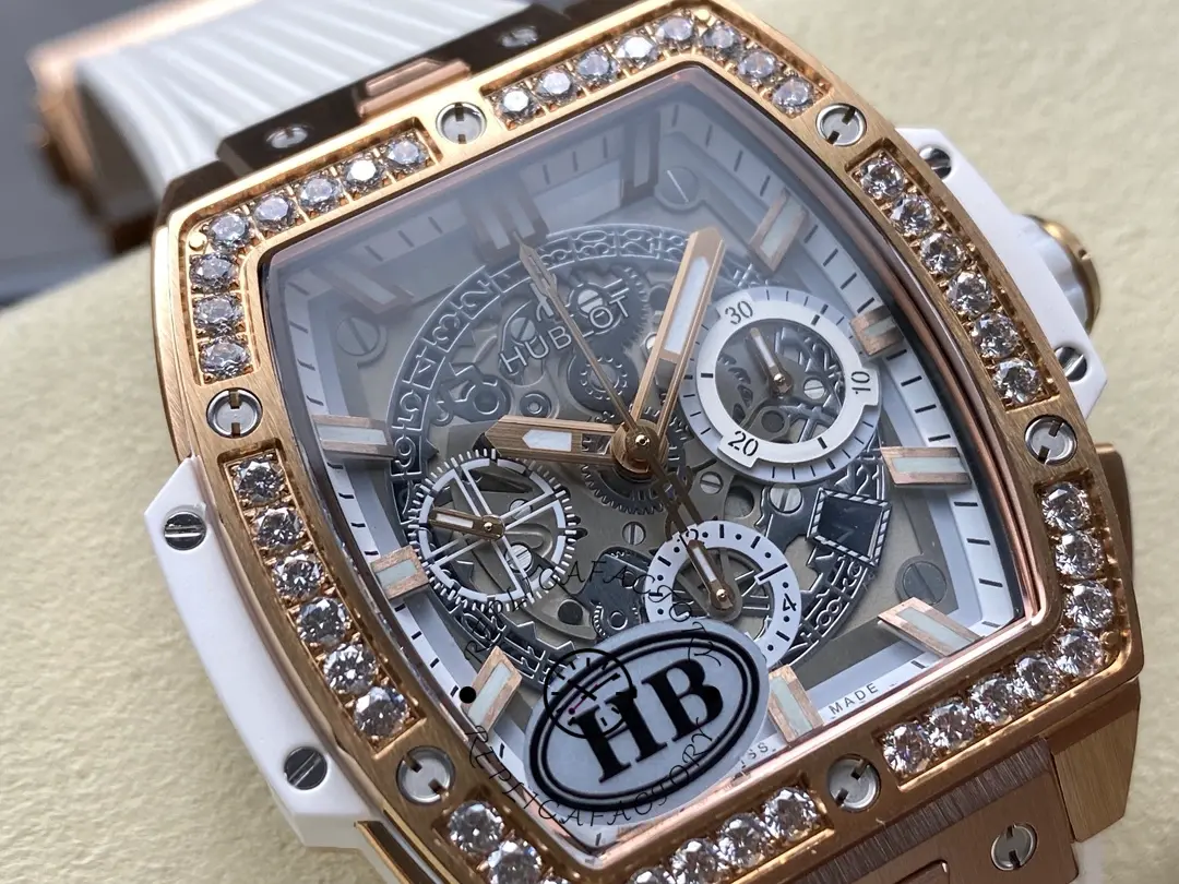 A photo of Hublot 642.OE.2010.RW.1204 placed on a pillow shows the appearance of the rose gold case and diamond bezel.