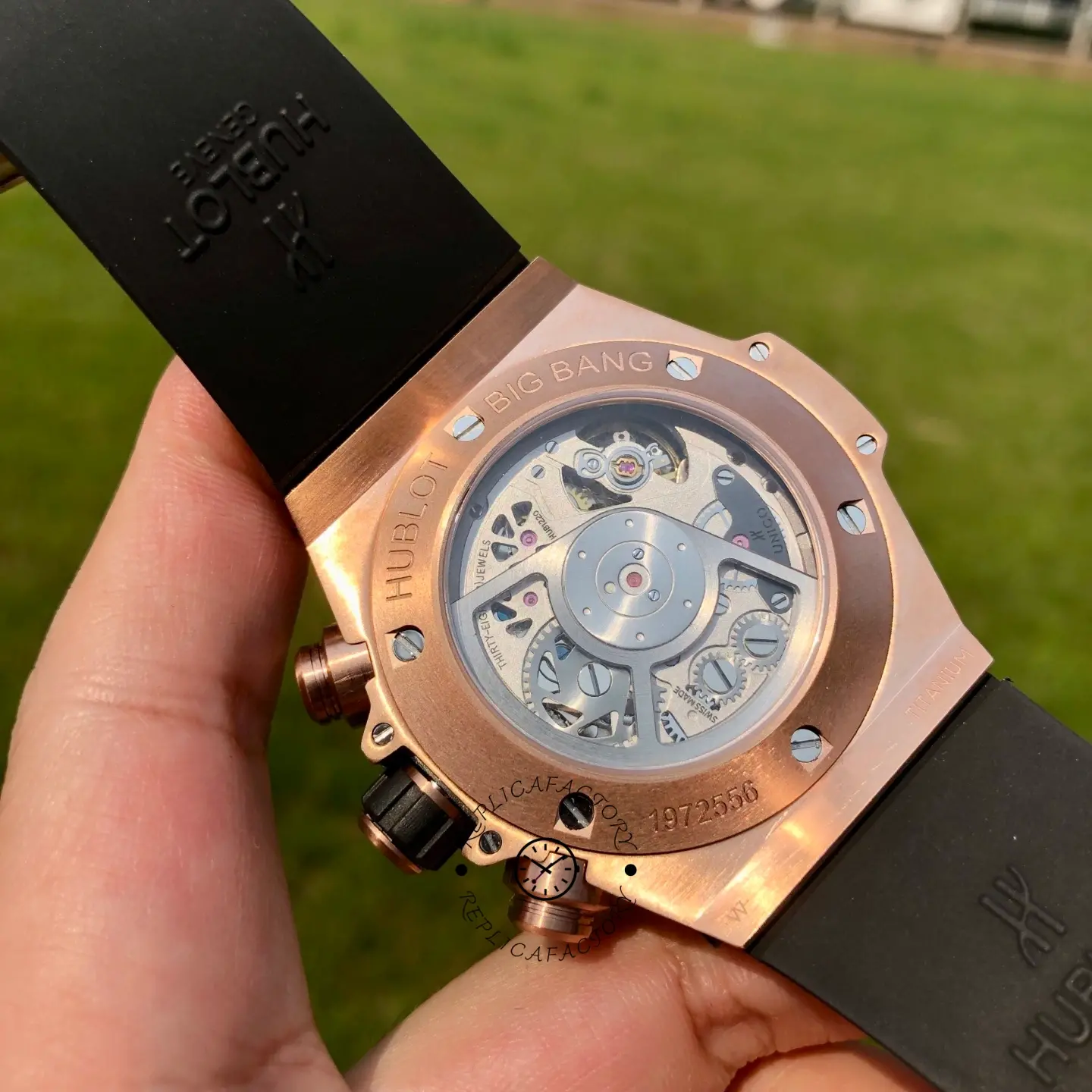 Caseback view of Hublot 421.OX.1180.RX.0904 showing exhibition back and automatic rotor.