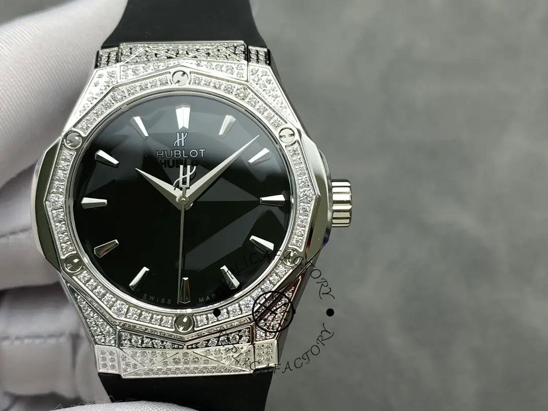 Full view of Hublot Classic Fusion 550.NS.1800.RX.1604.ORL19 on black rubber strap, held in a gloved hand.