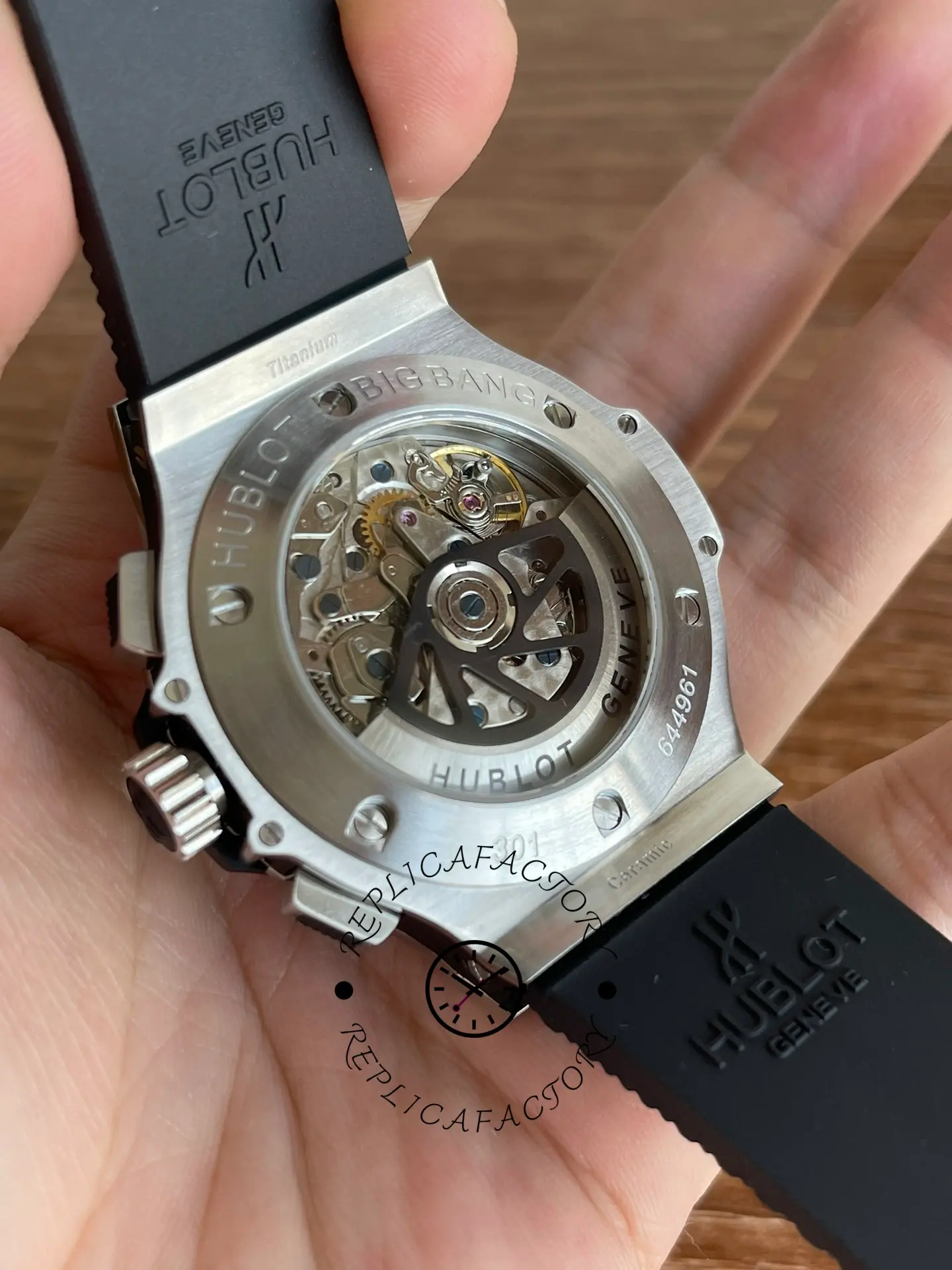 Caseback macro of Hublot Big Bang 301.SB.131.RX showing rotor cutouts and movement view.