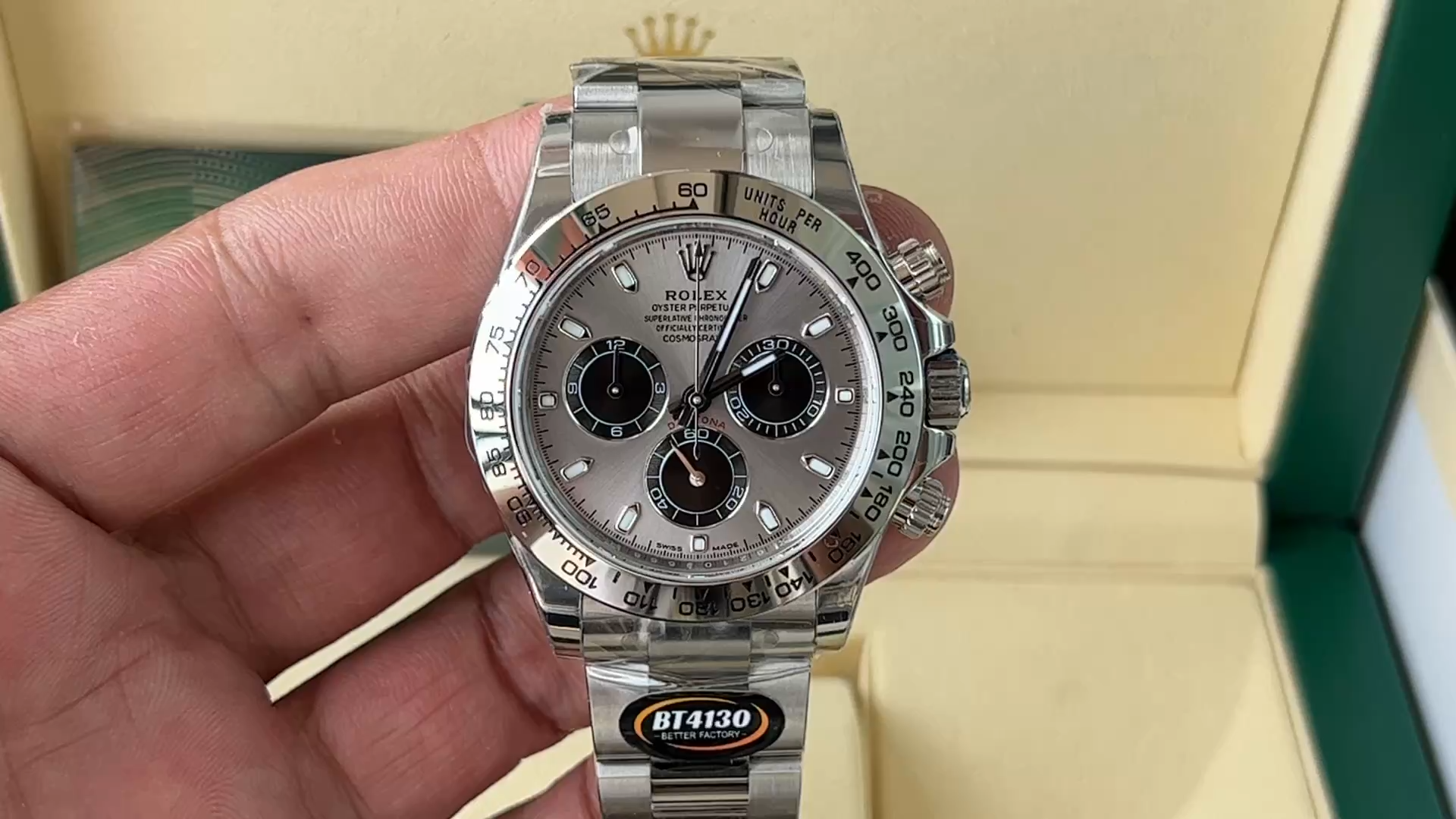 Hand-held video view of the Rolex Cosmograph Daytona 116509 40MM, silver dial and bezel visible. - Video