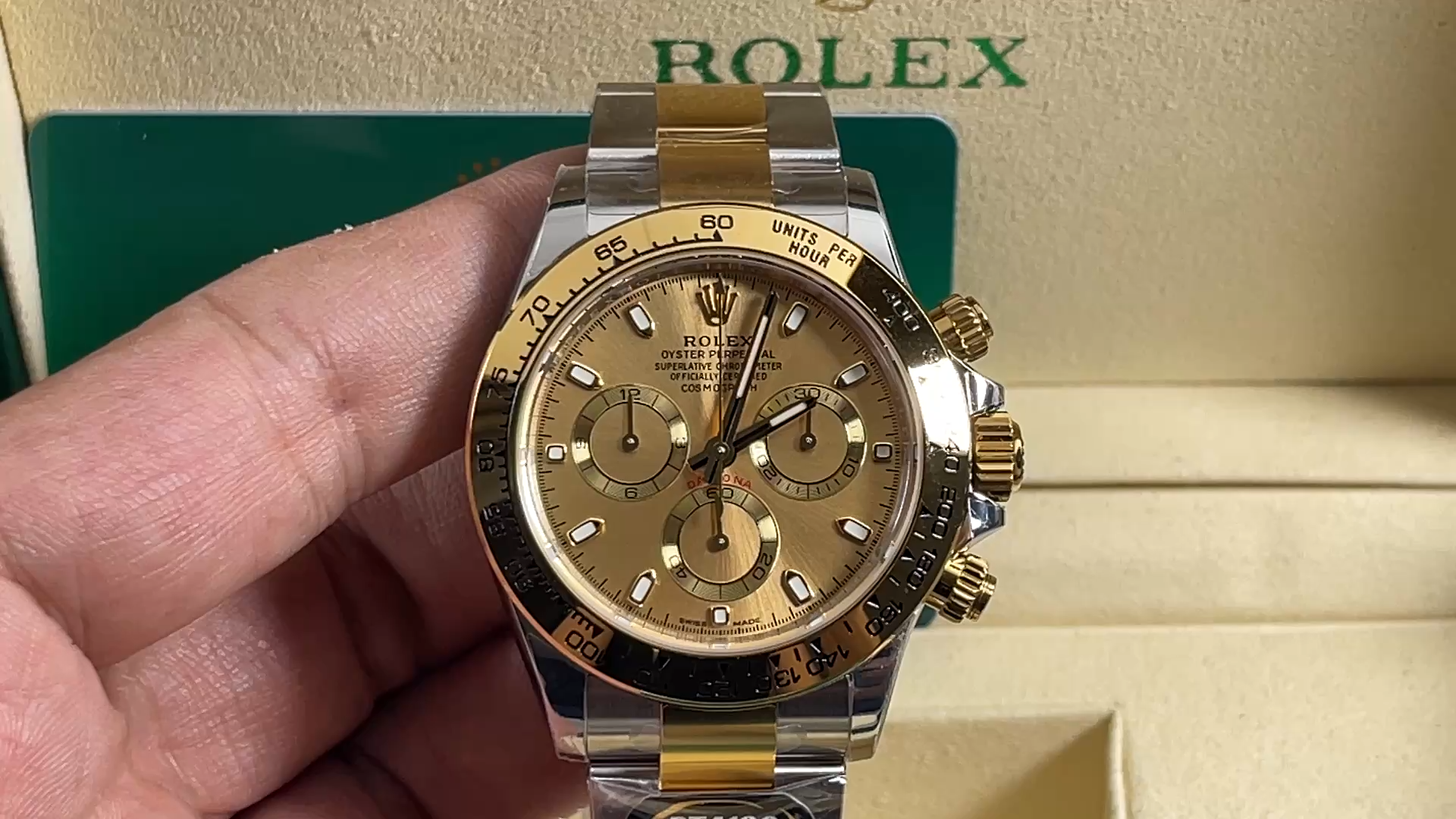 Rolex Daytona 116503 video, handheld view of champagne dial and gold bezel. - Video