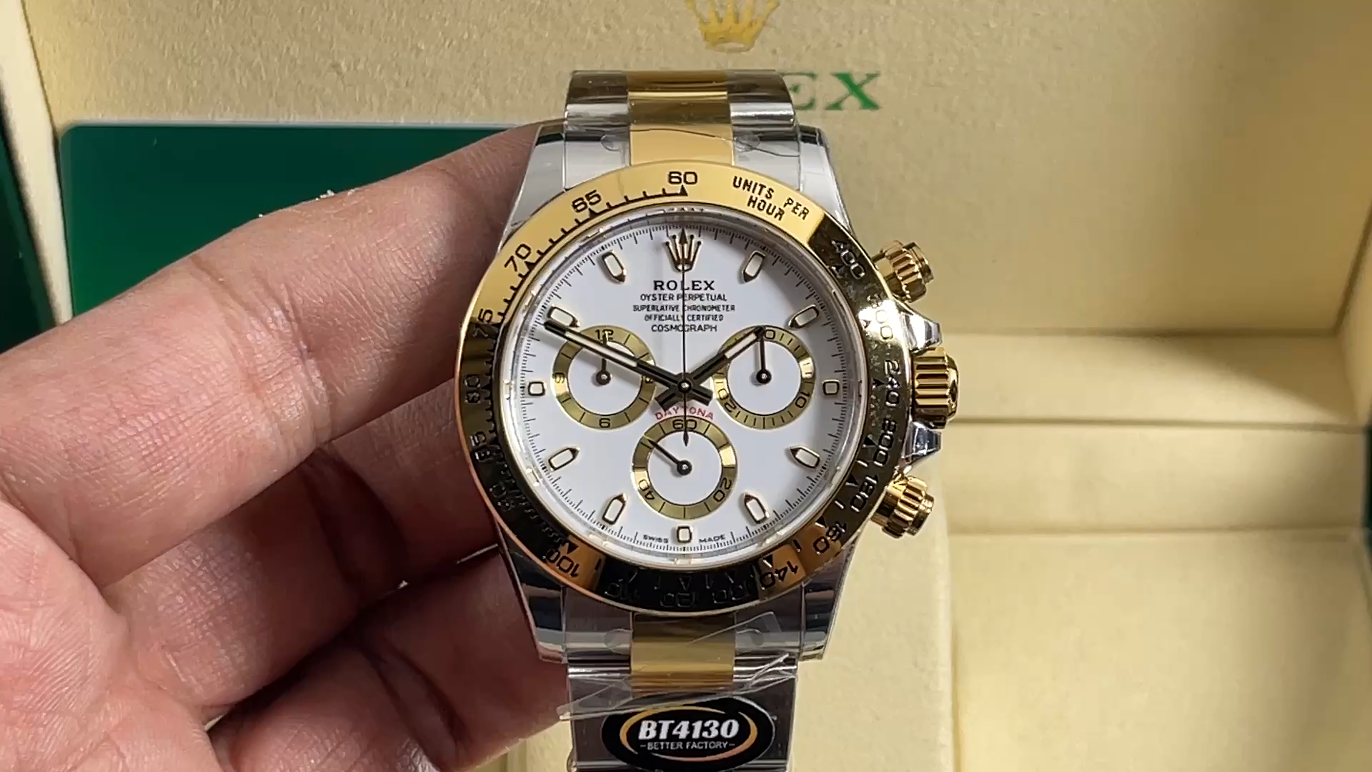 Rolex Daytona 116503 video, handheld view of white dial and gold bezel. - Video