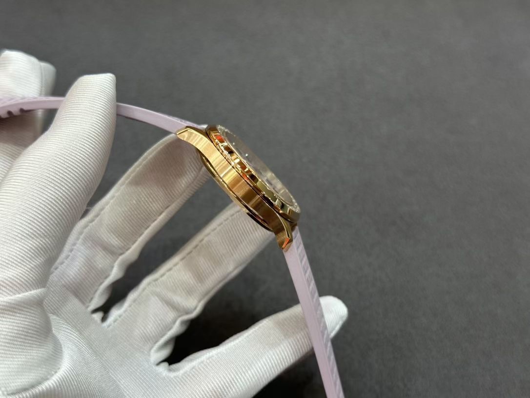 Side profile of Patek Philippe Aquanaut 5072R-001 showing slim case and strap curvature.