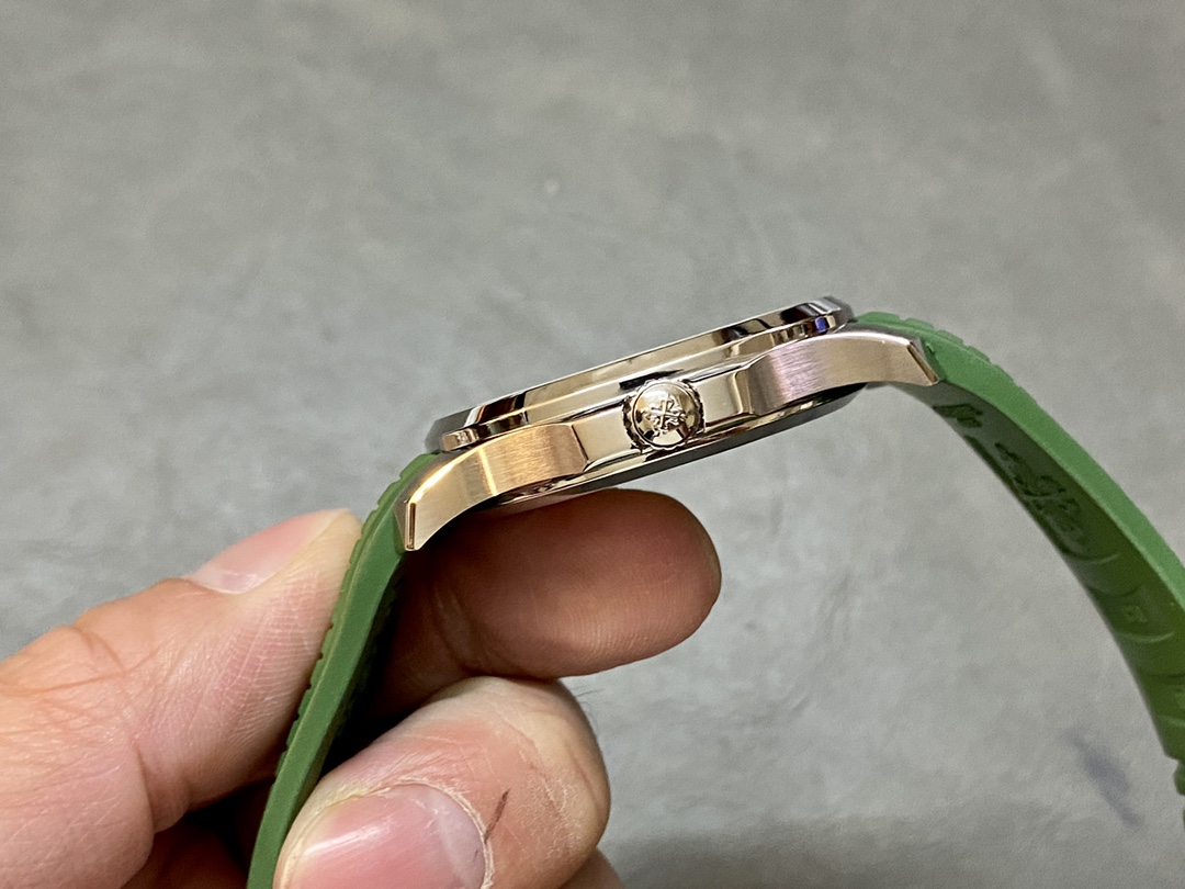 Side angle of Patek Philippe Aquanaut 5168G-010 showing crown side and polished case edge.