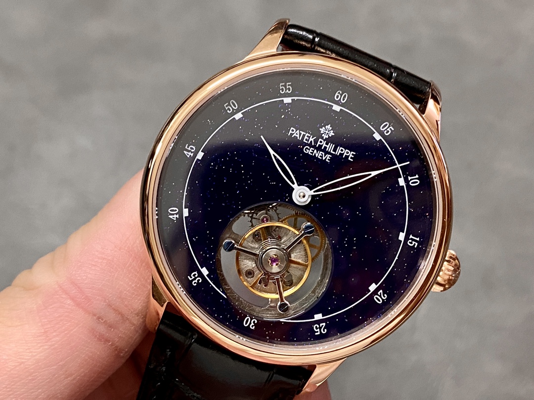 Side-tilt view of the Patek Philippe 6102P 001 emphasizing the curved case profile and bezel edge.