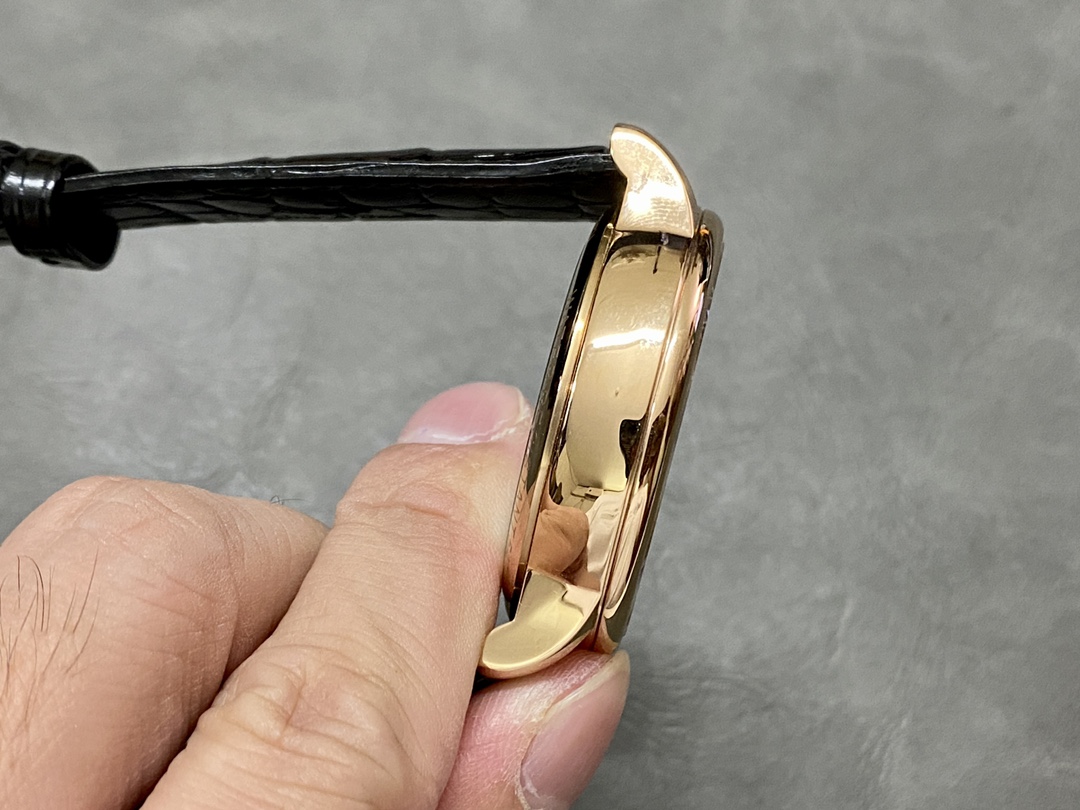 Patek Philippe Sky Moon Tourbillon 6102P 001, case side view with polished chamfers and strap connection.